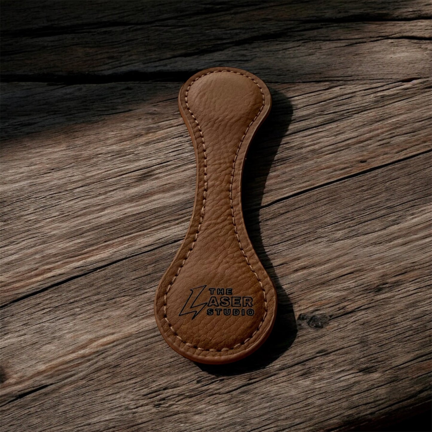 Marcalibros / Aprieta papeles de cuero sintético